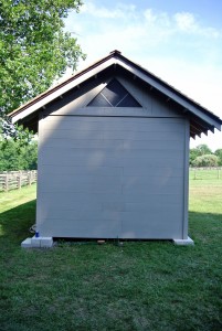 Siding is complete on both short sides of the coop.