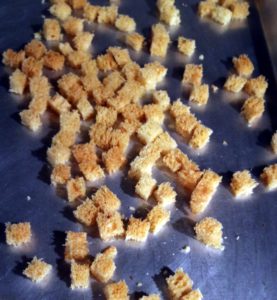 Brioche croutons lightly oven-toasted are ready for the fresh cauliflower soup.