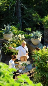 Here I am on the main terrace looking up at Kevin, who is taking this photo from a second floor bedroom balcony. I am surrounded by all the lovely lush, green container plants we potted last spring - agaves, hostas and palms.