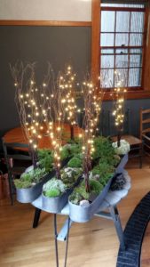 They look so beautiful with battery operated fairy lights weaved through the willow branches - one centerpiece for each of the three eight-foot long tables.