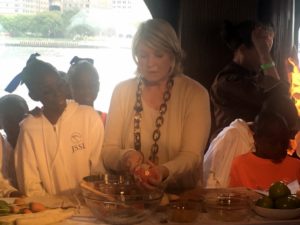 I showed our guests how I section the citrus, and invited some of the children to help me.