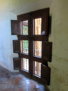 Ryan admired these wooden doors, outfitted with six smaller windows looking out onto the gardens.