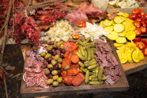 The reception included a charcuterie board filled with delicious meats, peppers and olives, fruits and breads.