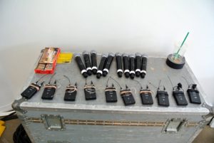 All the necessary microphones and battery packs were laid out and tested.