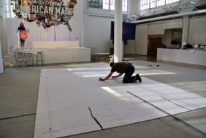 Final carpet pieces were measured, taped and positioned on the floor.