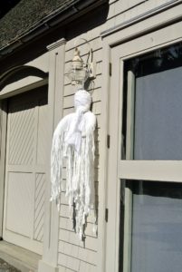 We hung this ghost from the outdoor light on one side of my gym building.