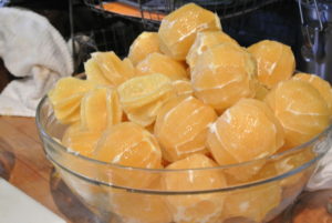 Oranges are also peeled, and sliced for the special citrus dessert.