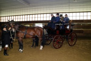 We're all ready and set to go. I am riding with Harvey, Mary, and Kelly. We all wore formal Coaching attire - for gentlemen, dark suits with top hats, and for ladies, long-sleeved jackets and brimmed hats.
