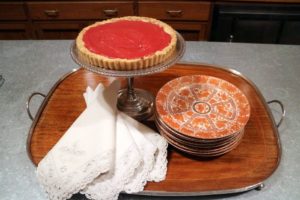 This is a cranberry curd tart my daughter, Alexis, made for our dessert. I love its rich red color. These beautiful orange Fitzhugh-patterned dessert plates were perfect for our tart.