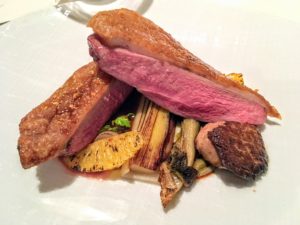 This is called Anatra - long island duck, parsnips, braised lettuce, charred oranges, with seared foie gras.