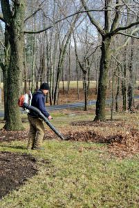 A leaf blower is most effective for gathering the bulk of a lawn’s leaves into large piles. These leaves are either taken to the woods or to the compost pile for decomposition.