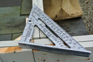 This is a seven-inch framing measurement ruler. It is used as a protractor, miter, or framing square, and is a 
must-have carpenter's tool for making precise right-angles.