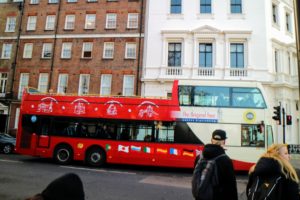 Here is one of London's iconic cherry red double-decker buses. The most recognized was the Routemaster, which was first introduced in 1956. Most double-deckers have been retired, replaced by the articulated bus, but a few more modern versions of the double-decker can still be spotted on certain routes.