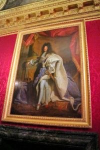 Here's Louis XIV - this time in high heeled shoes, garters, and ermine robes.