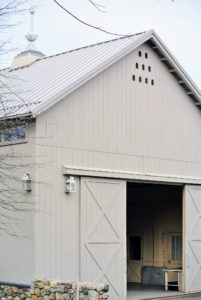 This is the Equipment Barn, which I had built soon after purchasing the farm. There are two large sliding doors at either end for accessing the equipment. The building is approximately 40 by 120-feet with substantial height.