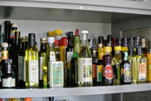 Olive oils were organized by height also. Store vegetable oils in the original bottles, unrefrigerated, in a cool, dark place up to six months. Refrigerate nut oils, such as walnut oil, and use within three months.