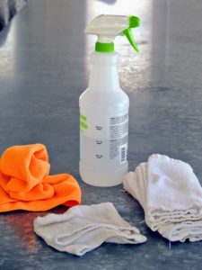 A good all-natural cleaning solution using a mixture of equal parts white vinegar and water in a spray bottle will clean them well.