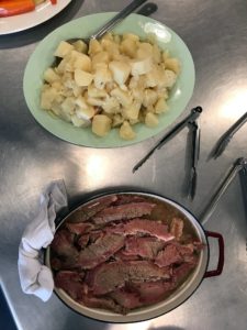 The potatoes were cooked separately - par-cooked and finished in the same liquid from the corned beef.