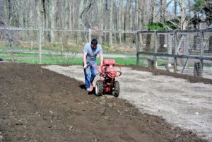 Wilmer goes over the area very carefully to ensure every bit of soil is turned.