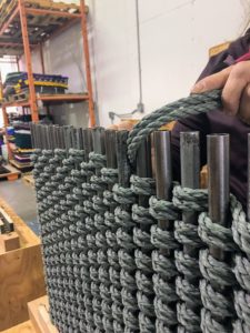 Here is another mat on a loom. Once the weaving part of the process is done, the doormat is removed from the base for the final steps. This doormat is called "Bluestone Basketweave". (Photo by Dawn Stahl)