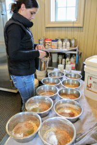 Meanwhile, inside my stable feed room, Sarah prepares the horses' supplements. Each horse gets a variety of vitamins and minerals to keep them feeling healthy and looking their best.