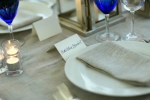 Handwritten place cards directed guests to their seats. (Photo by Phillip Lehan)