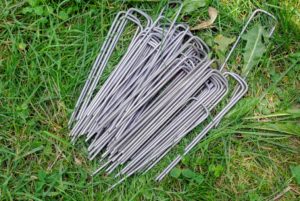 These sod staples are used to keep the netting taut and well secured to the ground.