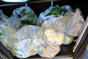 Once everything is washed and dried, the vegetables are then stored in the refrigerator until they’re packed up in coolers ready to be taken to East Hampton.