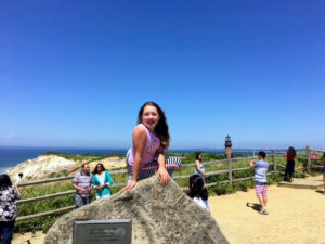 11-year old Ava stopped for this quick snapshot on a rock marking the landmarked Gay Head Cliffs of Aquinnah.