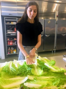 Here is video production intern, Jessica Hopen, preparing the greens in our test kitchen earlier that morning.