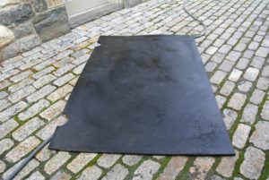 Outside, the mats are drying very well.