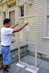 We always clean storm windows and doors before installing them - dust can always accumulate while they are in storage during the off seasons.