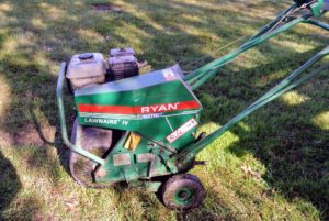 This is our Ryan Lawnaire IV walk-behind aerator. Because my lawn is quite large, it is much easier to use a machine specifically designed for this process.