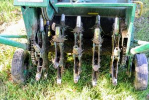 Our aerator has 30 steel tines, which remove small cores of soil from the lawn. Doing this reduces soil compaction and promotes root growth.
