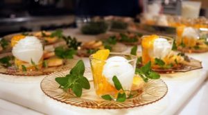 Our dessert is fresh orange section with homemade buttermilk sorbet and sprigs of mint from my garden. A Mailanderli cookie adds a perfect touch on each plate.