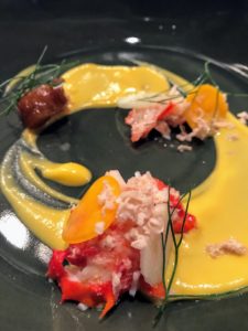 This is buttered Alaska King crab with butternut squash purre and shaved foie gras torchon by Chef Lionel Uddipa.