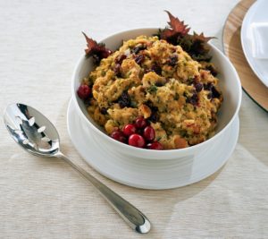This cherry stuffing is another big favorite. It is made with chunks of crusty white bread crumbs, blended with butter, chicken broth, freshly chopped onion and celery, lots of herbs, and sweet tart dried cherries.