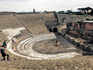 The ancient city, Pompeii, which was buried by the 79 A.D. eruption of Mount Vesuvius is fascinating. Ruins here include the city's amphitheater.