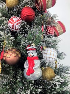 We always assess our collection of ornaments every year to make sure we develop the best, most detailed decorations. I love this festive snowman ornament.