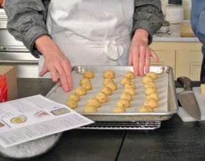 Jen and I rolled the dough into balls, placed them on a cookie sheet and then into the oven - it's such an easy recipe, and my mother, "Big Martha" made it every year for our family's holiday celebrations.