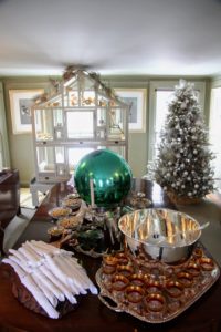 My Bird Room is on the other side of the foyer. It is the smaller of two dining rooms. Here, Laura added touches of green and silver - in the back right corner is another gorgeous tree.