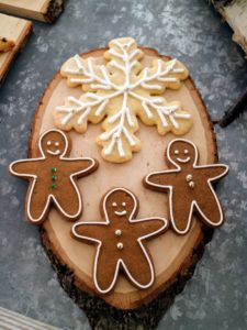Here are traditional gingerbread men and a big sugar cookie snowflake.