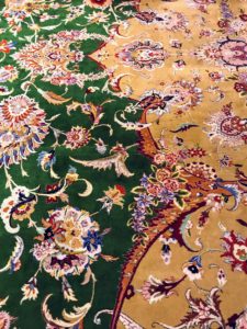 The carpet was made by some 1200 to 1300 carpet knotters. It weighs 35-tons and is predominantly made from wool originating from New Zealand and Iran.