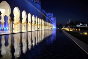 The pools along the arcades of the mosque reflect the columns. The unique lighting system was designed by lighting architects Speirs and Major Associates to reflect the phases of the moon.
