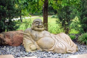 And this is Hotei, the God of Happiness. Hotei has a cheerful face and a big belly. He carries a large cloth bag over his back - one that never empties. He uses it to feed the poor and needy.