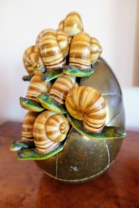 This egg covered with snails is also made out of ceramic and brass. It is one of Lisbeth's smaller pieces, but still so intricate in sculpture. Sergio uses great care in every piece he creates. Each piece belongs to a limited edition and therefore unique.