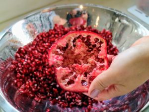 This is what the pomegranate half looks like after tapping most of the seeds out.