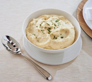 You can still get my mom's popular mashed potatoes. These are made with peeled russet potatoes, whole milk, cream cheese, real butter, and heavy cream.