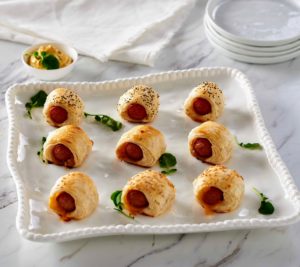 Of course, you can still buy everyone's favorite appetizer - my pigs in a blanket - beef franks wrapped in puff pastry. There are 48 in all.