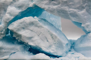 The Fish Islands are a group of small islands lying in the northern part of the entrance to Holtedahl Bay, off the west coast of Graham Land in Antarctica. Here, a large chunk of ice separated from the iceberg - you can see where it broke off.